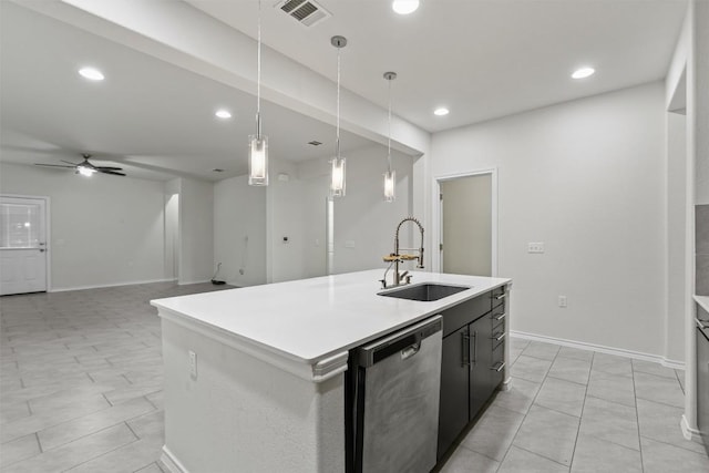 kitchen featuring a center island with sink, visible vents, dishwasher, light countertops, and a sink