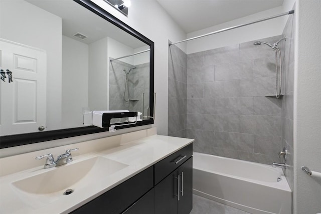 full bathroom featuring vanity, visible vents, and bathing tub / shower combination