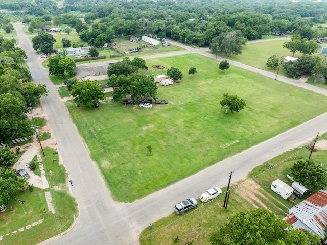 birds eye view of property with a rural view