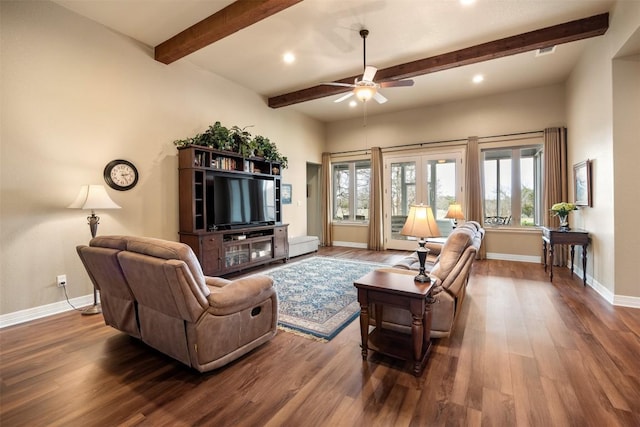 living room featuring dark wood-style floors, beam ceiling, baseboards, and a ceiling fan