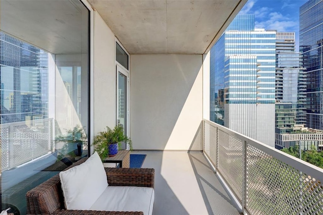 balcony featuring a view of city