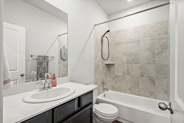 bathroom with vanity, toilet, and shower / bathtub combination