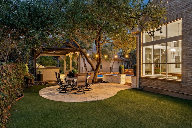 view of yard featuring a patio area and fence