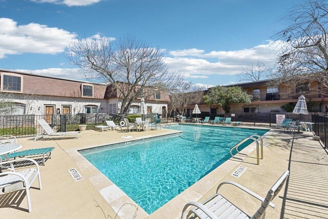 7801 Shoal Creek Blvd Unit 224, Austin, TX 78757 - community pool featuring a patio