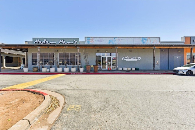 7801 Shoal Creek Blvd Unit 224, Austin, TX 78757 - view of property featuring uncovered parking