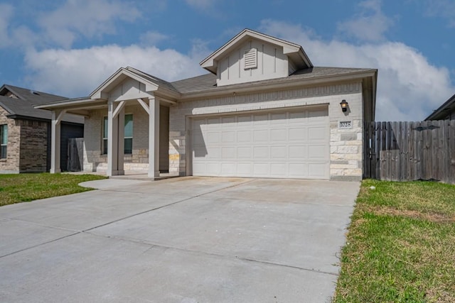 ranch-style house featuring a garage, brick siding, fence, stone siding, and driveway