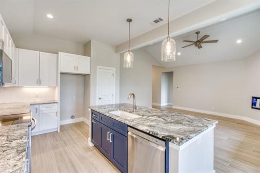 kitchen with stainless steel appliances, white cabinetry, a sink, and light wood-style flooring