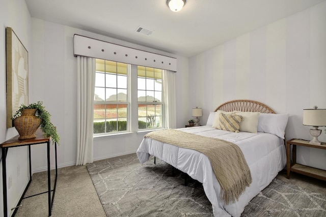 858 Cherrystone Loop, Buda, TX 78610 - carpeted bedroom with baseboards and visible vents