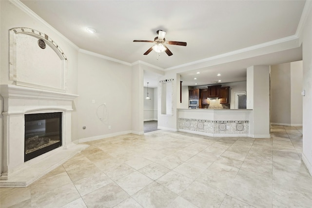 2989 Agave Loop, Round Rock, TX 78681 - unfurnished living room with a ceiling fan, a premium fireplace, crown molding, baseboards, and recessed lighting