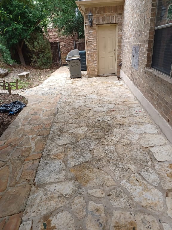 view of patio / terrace with fence and area for grilling