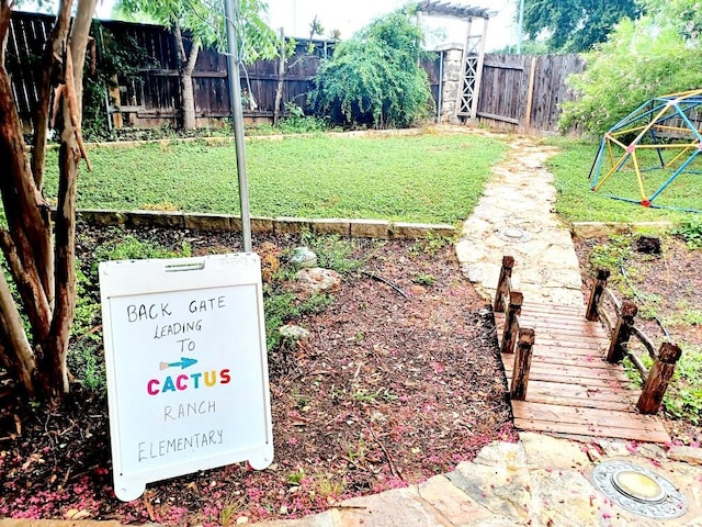 view of yard with fence