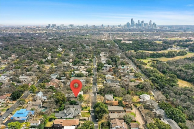 birds eye view of property featuring a city view