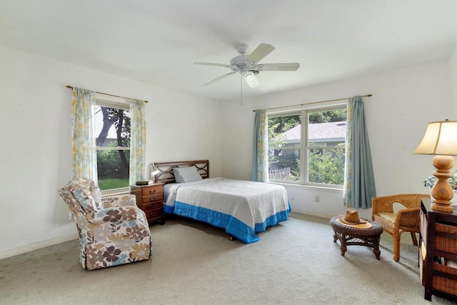 bedroom featuring ceiling fan and carpet floors