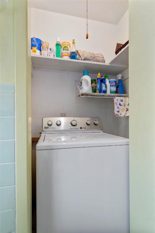 washroom featuring washer / dryer and laundry area