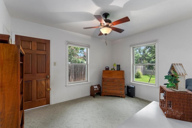 interior space featuring a ceiling fan