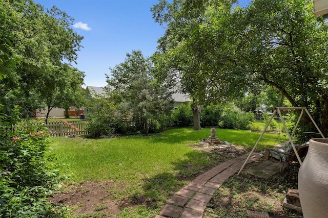 view of yard with fence