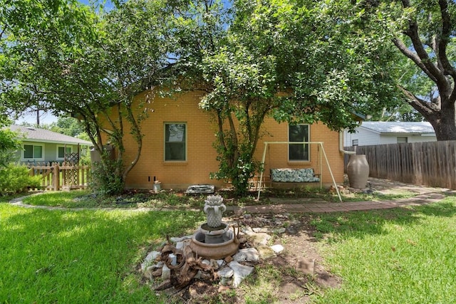 1805 Eubank St, Georgetown, TX 78626 - rear view of house with brick siding