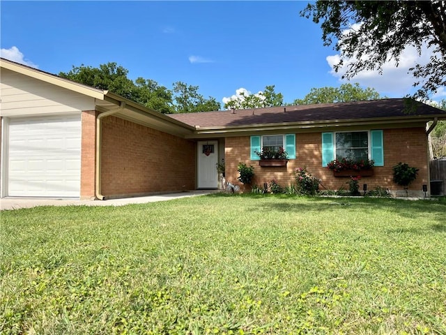 ranch-style house with a garage, brick siding, and a front lawn