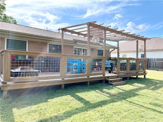 rear view of house with brick siding, a yard, a shingled roof, fence, and a pergola