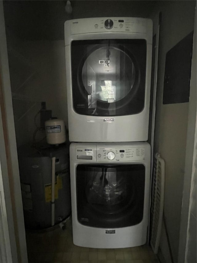 9226 Jollyville Rd Unit 121, Austin, TX 78759 - washroom featuring stacked washer / drying machine