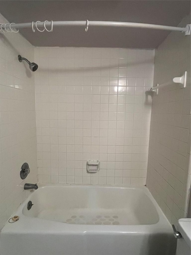 full bathroom with  shower combination and toilet