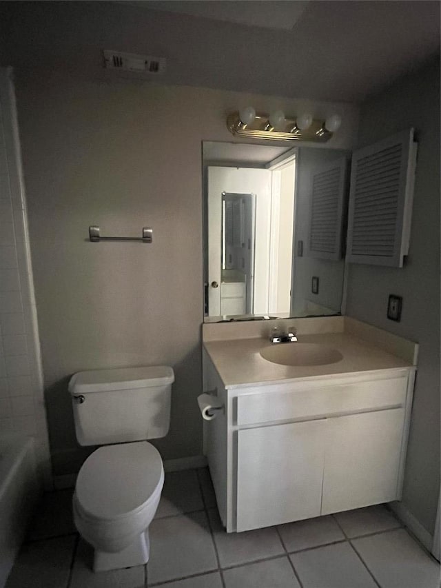 full bath featuring a bathtub, visible vents, toilet, vanity, and tile patterned flooring