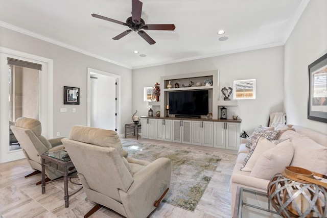 living room with ceiling fan, ornamental molding, and recessed lighting