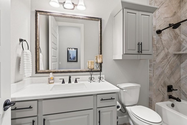 bathroom with toilet, tub / shower combination, and vanity