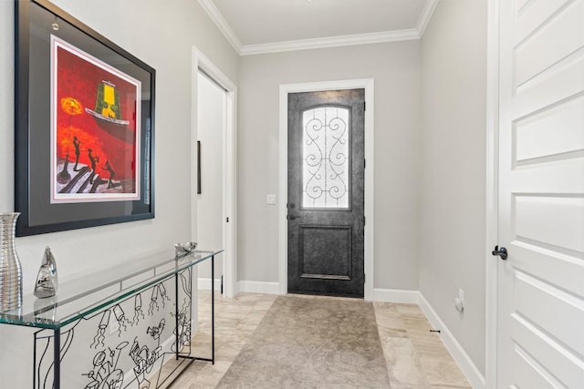 entrance foyer with crown molding and baseboards