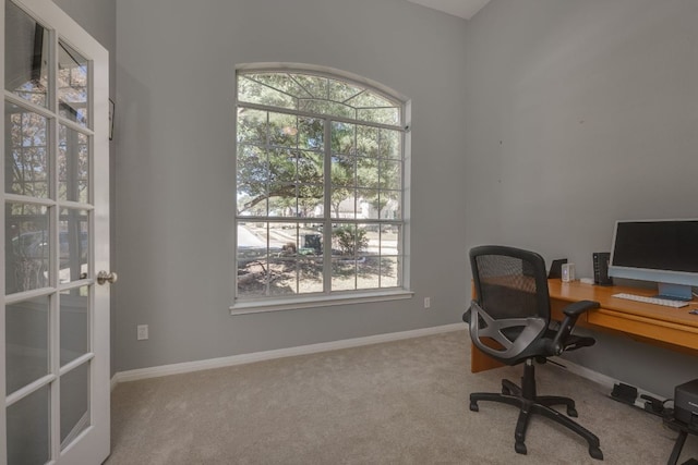 home office featuring carpet floors and baseboards