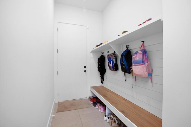 23937 Oscar Rd, Spicewood, TX 78669 - mudroom featuring tile patterned floors and baseboards
