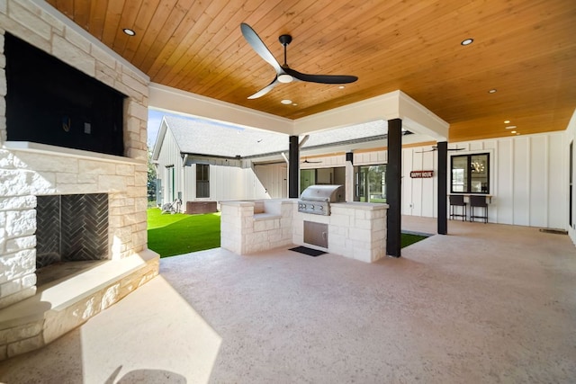 23937 Oscar Rd, Spicewood, TX 78669 - unfurnished living room featuring wood ceiling, carpet, ceiling fan, an outdoor stone fireplace, and recessed lighting