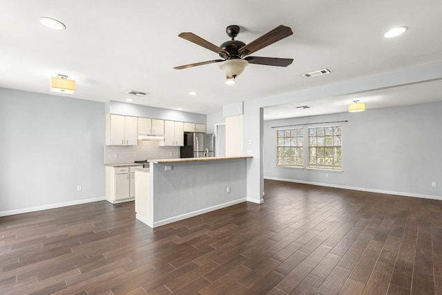 12314 Double Tree Ln, Austin, TX 78750 - kitchen featuring freestanding refrigerator, open floor plan, a ceiling fan, dark wood-style floors, and recessed lighting