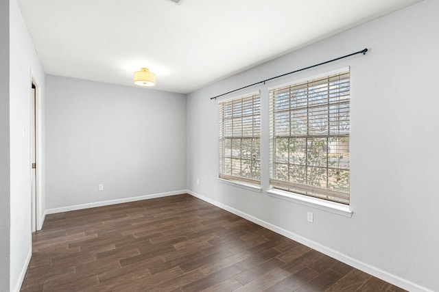 12314 Double Tree Ln, Austin, TX 78750 - empty room with dark wood-style flooring and baseboards