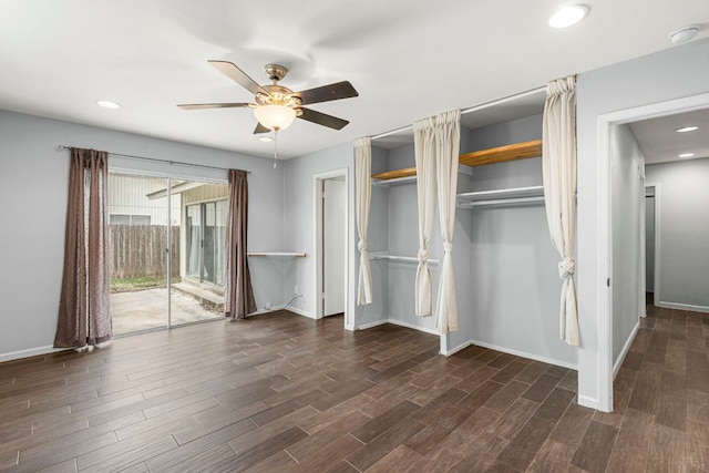 12314 Double Tree Ln, Austin, TX 78750 - unfurnished bedroom with dark wood-style flooring, baseboards, two closets, a ceiling fan, and recessed lighting