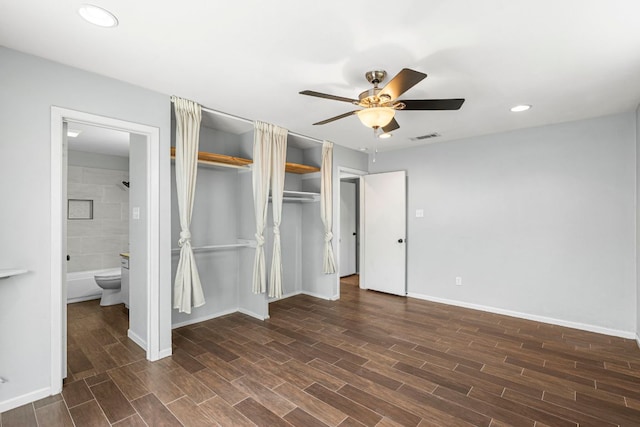 12314 Double Tree Ln, Austin, TX 78750 - unfurnished bedroom featuring wood finished floors, baseboards, recessed lighting, and two closets