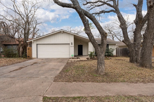 12314 Double Tree Ln, Austin, TX 78750 - mid-century modern home with an attached garage, concrete driveway, and brick siding