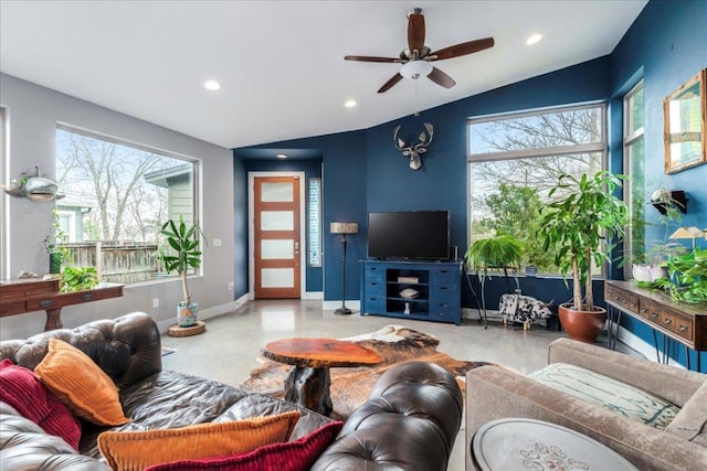 living room with vaulted ceiling, a wealth of natural light, and recessed lighting