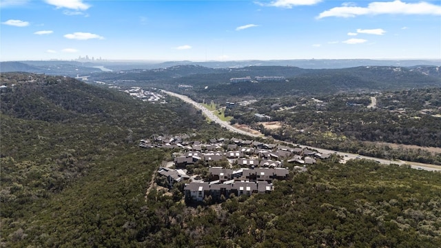 birds eye view of property with a mountain view