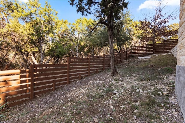 view of yard featuring fence