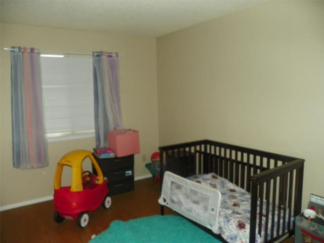 bedroom with baseboards