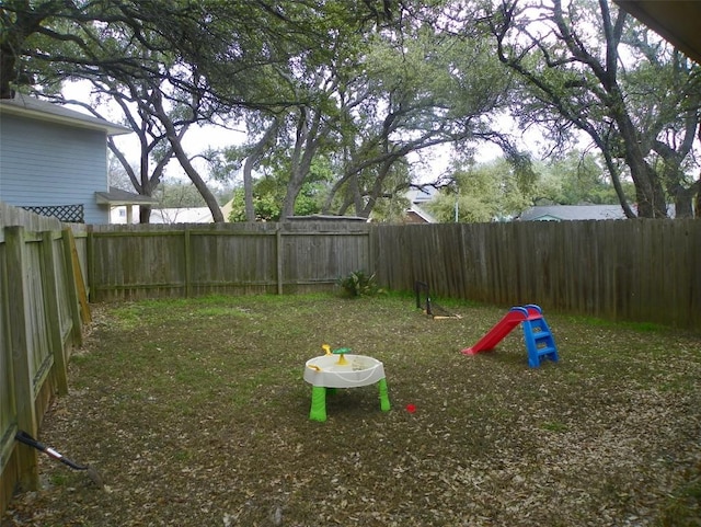 view of yard featuring a fenced backyard