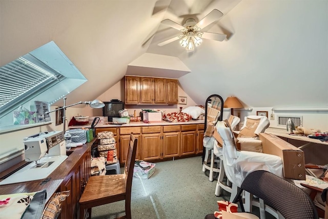 office space featuring ceiling fan and lofted ceiling