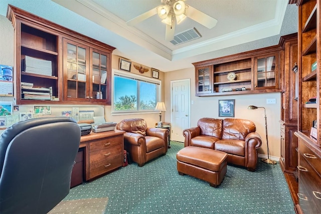 home office featuring visible vents, a raised ceiling, ceiling fan, and ornamental molding