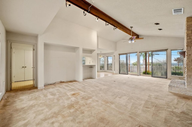 unfurnished living room featuring high vaulted ceiling, beamed ceiling, carpet flooring, and visible vents