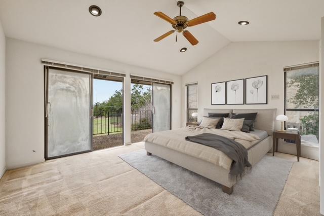 carpeted bedroom featuring vaulted ceiling, ceiling fan, recessed lighting, and access to exterior