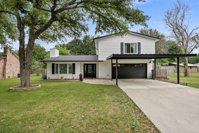 traditional-style house with a chimney, an attached garage, a front yard, fence, and driveway