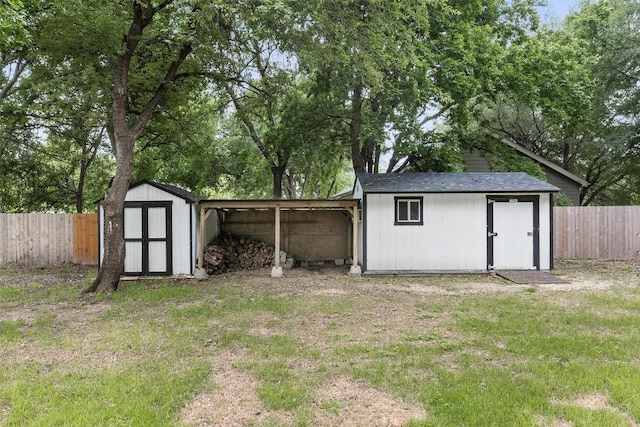 view of shed featuring a fenced backyard