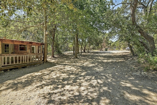 exterior space featuring dirt driveway