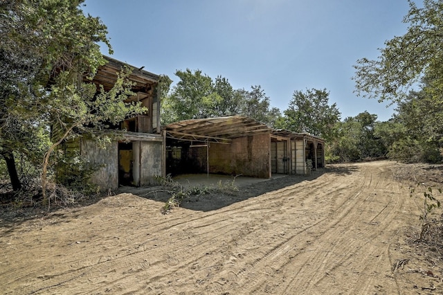 exterior space featuring an outbuilding